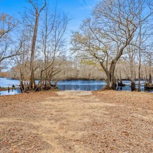 View of yard with a water view