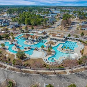 Aerial view of property and surrounding area featu