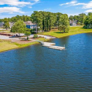 Water view with nearby suburban area