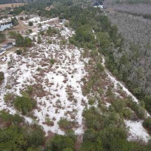 Aerial overview of property's location with a larg
