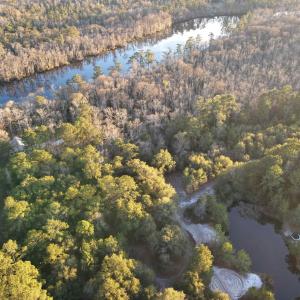 Aerial view of property and surrounding area with