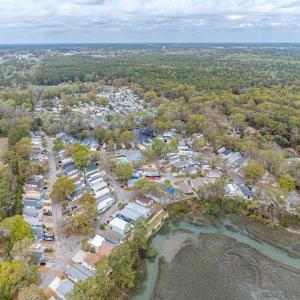 Aerial view of property and surrounding area with