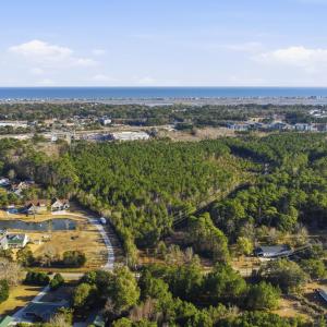 Aerial view of property and surrounding area featu