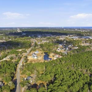 Aerial view of property's location featuring a nea