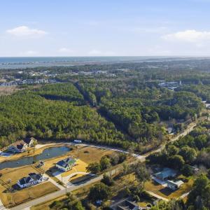 View of property location with a nearby body of wa