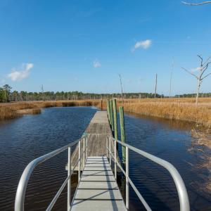 Dock featuring a water view