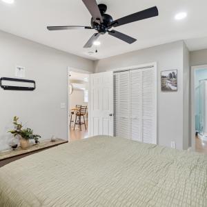 Bedroom with recessed lighting, a ceiling fan, a c