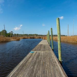 Dock area featuring a water view