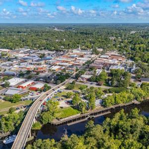 Aerial view of property's location with a heavily