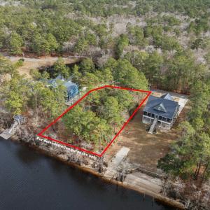 Aerial view of property and surrounding area with