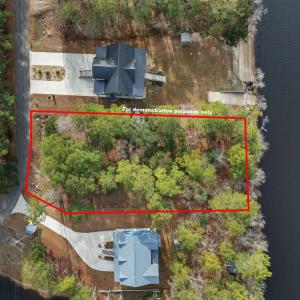 Aerial view of property and surrounding area with