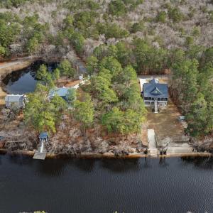 Aerial view of property's location with a large bo