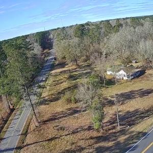 View of property location featuring a heavily wood