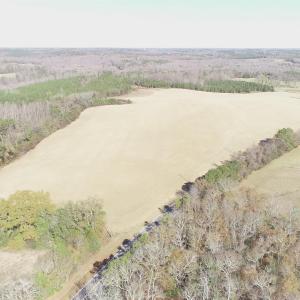 Aerial view of sparsely populated area with a heav