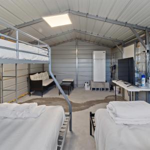 Garage featuring metal wall