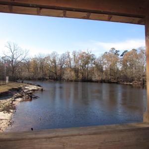 View of the river from the gazebo with fencing, ga