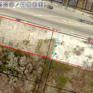 Aerial map of property and surrounding area featur