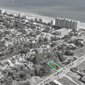 View of urban area with waterfront with a beach an