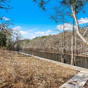 View of yard with a water view