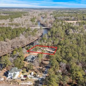 Aerial view of property's location with a nearby b