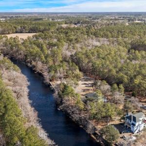 Bird's eye view of a large body of water and a for