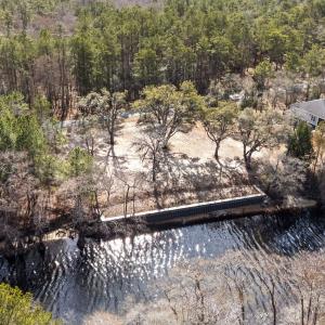 Aerial view of property and surrounding area with