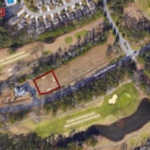 Aerial view of property's location featuring a gol