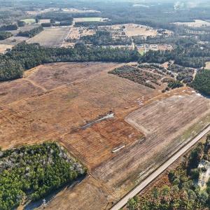 Aerial view of property and surrounding area featu