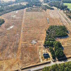 Aerial view of property and surrounding area featu