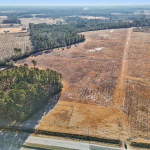 Aerial view of sparsely populated area featuring f