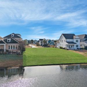 Water view featuring nearby suburban area
