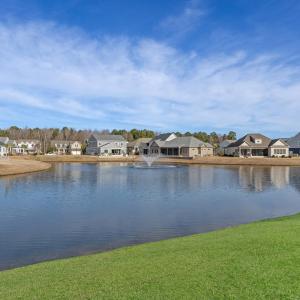 Water view with nearby suburban area