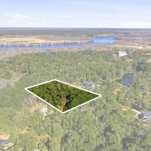 Aerial view of property and surrounding area with