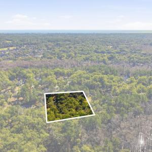 Aerial view of property and surrounding area featu