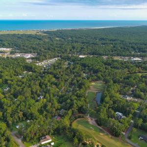 Aerial view of property and surrounding area featu