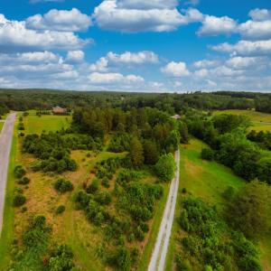 View down gravel drive and Two Bid Road