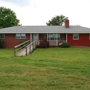 According to County Records This Well Built Brick Residence contains  Three Bedrooms, 2 Full Baths, Kitchen and Living Room with Fireplace, Plus a 1230 Sq. Ft.  Basement and Central Heat and Air-conditioning.