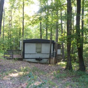 Abandoned mobile home.  Home is not in liveable condition.