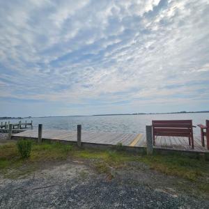 Sitting area on the Oyster Bay, Come sit or crab on the bench provided in the community.