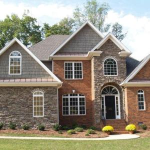 This is an example of the House Plan that is approved for affluent Crown Ridge Estates. As of 2024 the value of the home being built and the one starting construction soon is $1,000,000 to $1,300,000. Purchasers should anticipate to spend 1M turn key.