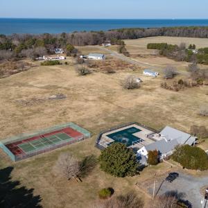 View of clubhouse and tennis court