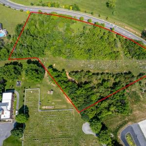 Left side setting of land off of Springbrook Road looking West.