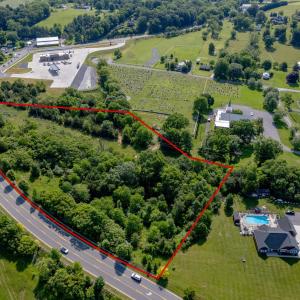 Showing site to the right of Springbrook Road heading East.