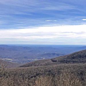 Similar Valley and Mountain views are available upon construction. This is the view from the home immediately to the left of the homesite.