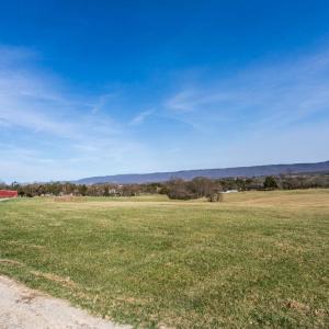 with lane to home site and pole shed.