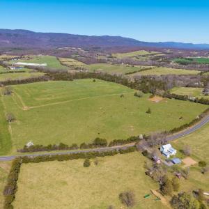 East Point Road frontage looking due north.  In view is the grazing pasture, with hay pasture just beyond.