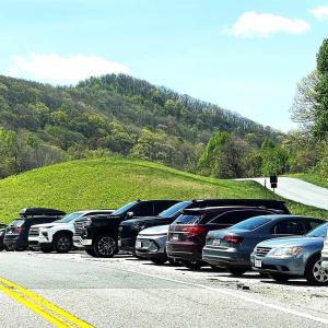 Much easier and safer to park in the parking area at the AT entrances next to the Parkway.  Walk down to property and access at the end of the guardrail off of Reeds Gap Rd.