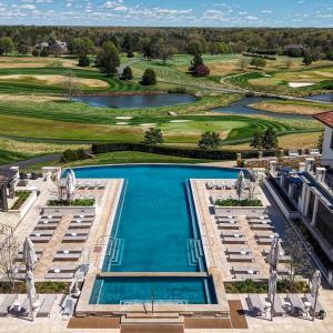 Infinity pool & cabanas, view of the Full Cry links-style championship golf course designed by Pete Dye.