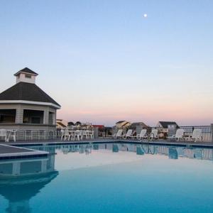 Community pool at sunset