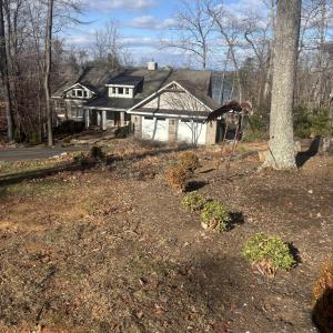 Neighbors home to left of lot